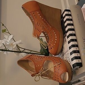Congnac/Tan/Camel color Leather wedges size 8.5. "Restricted" brand.